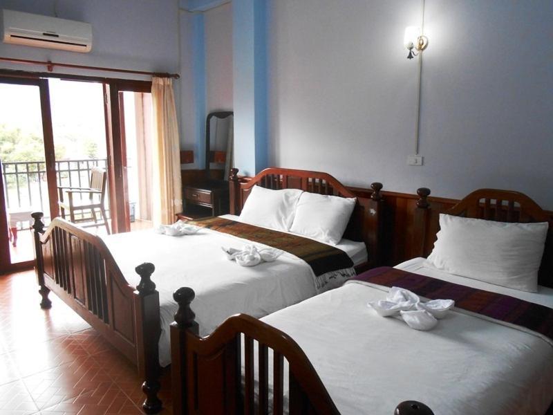 Domon Hotel วังเวียง ห้อง รูปภาพ